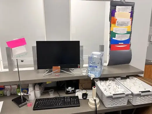Reception desk with computer at Heritage Treatment Centers, a detox center in Baltimore.