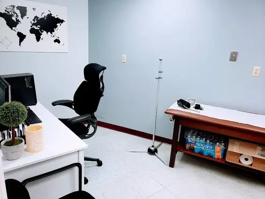 Minimalist office space with desk and chair at Bel Air Recovery Center LLC, a detox center in Baltimore.