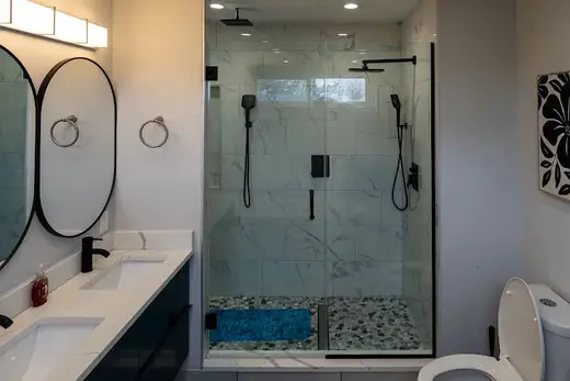 Modern bathroom with dual sinks at Female Sober Living - Bay Homes, a sober living home in Baltimore.