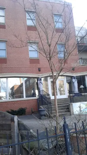 Welcoming entrance with large windows at Marian House, a sober living home in Baltimore.